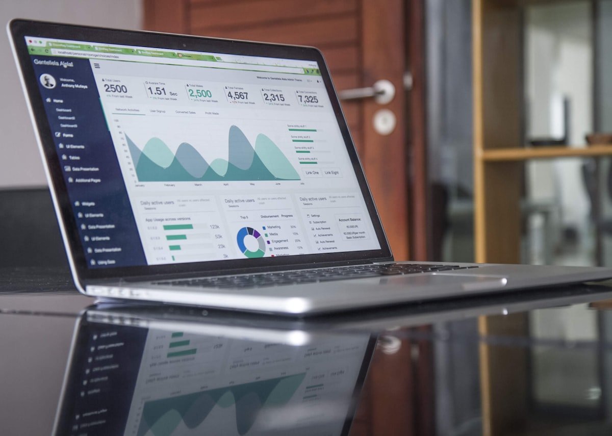Financial information displayed on a laptop dashboard